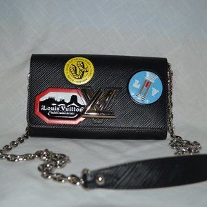 $3800  Louis Vuitton Epi World Tour Twist Chain Wallet Noir Black Crossb…